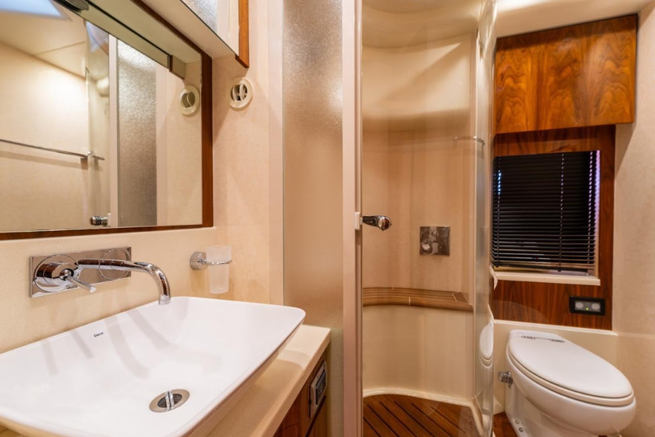 a bathroom with a shower and sink aboard FAIRLINE SQUADRON 70 - 2010 Yacht for Sale