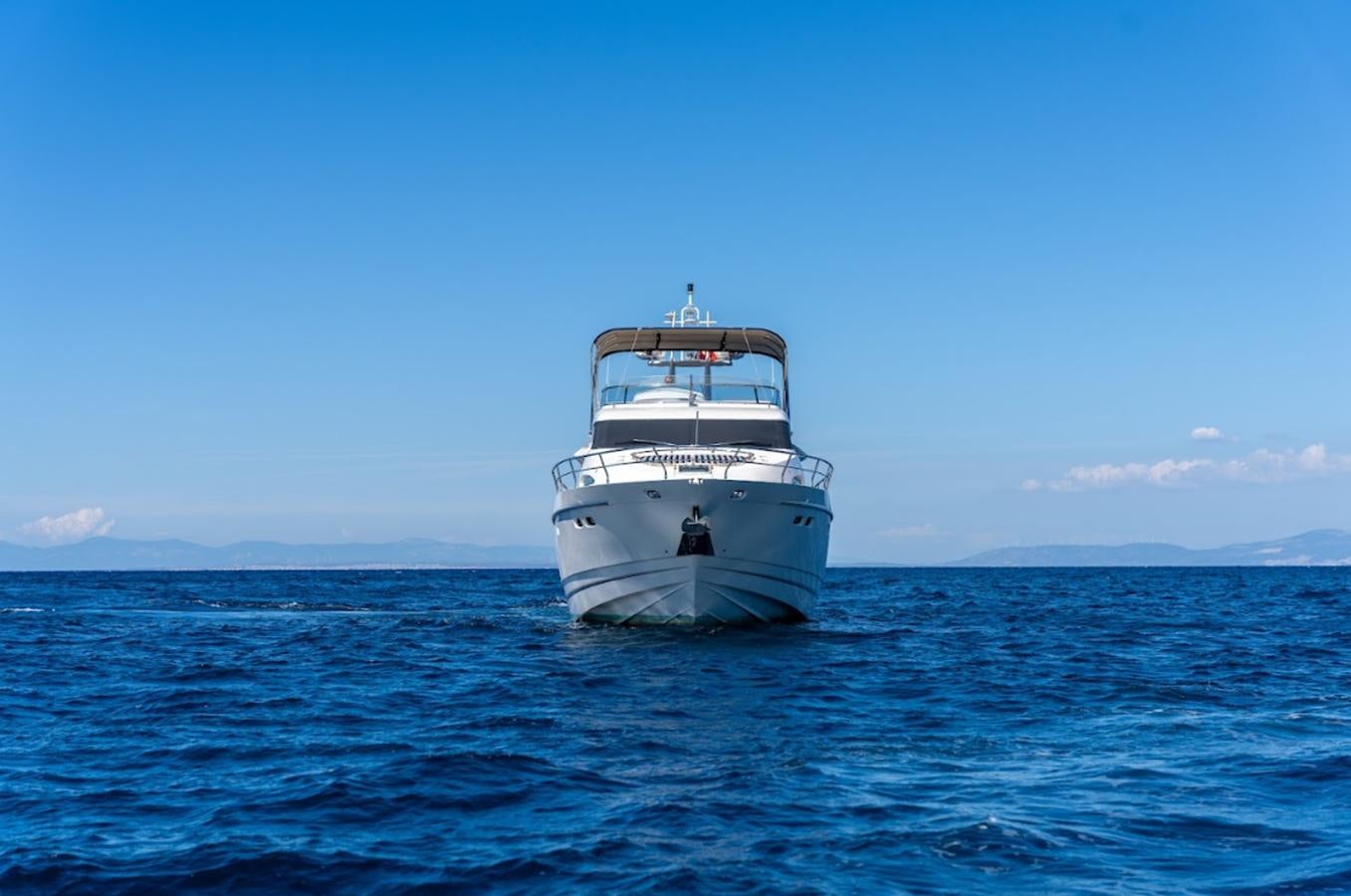 a boat in the water aboard FAIRLINE SQUADRON 70 - 2010 Yacht for Sale