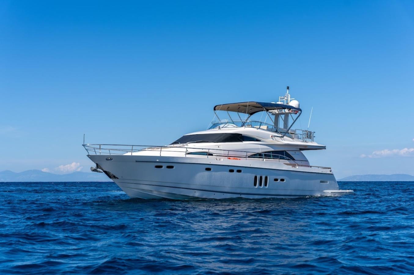 a white yacht in the water aboard FAIRLINE SQUADRON 70 - 2010 Yacht for Sale