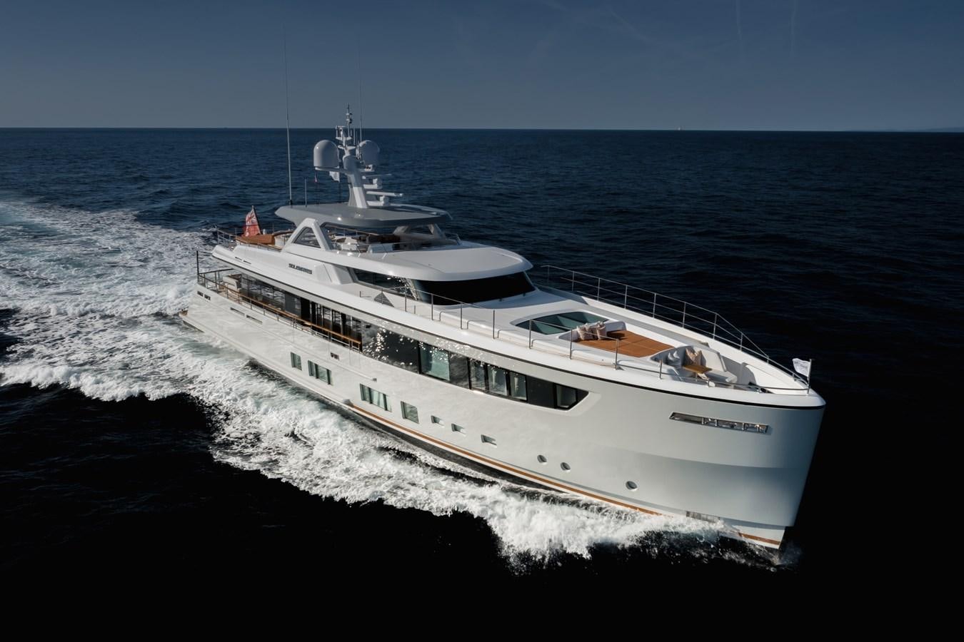 a white boat on the water aboard SOLEMATES Yacht for Sale