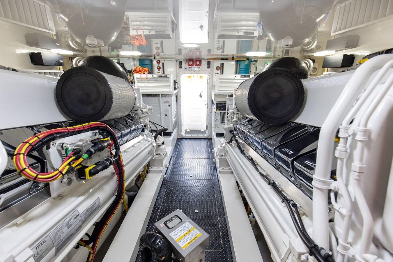 a room with machines and machinery aboard TEAM HARVEY Yacht for Sale