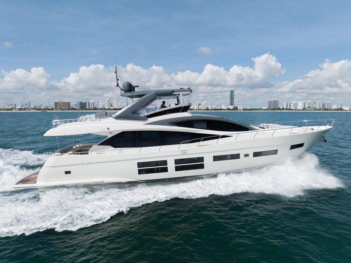 a white yacht on the water aboard SEADUCTION Yacht for Sale