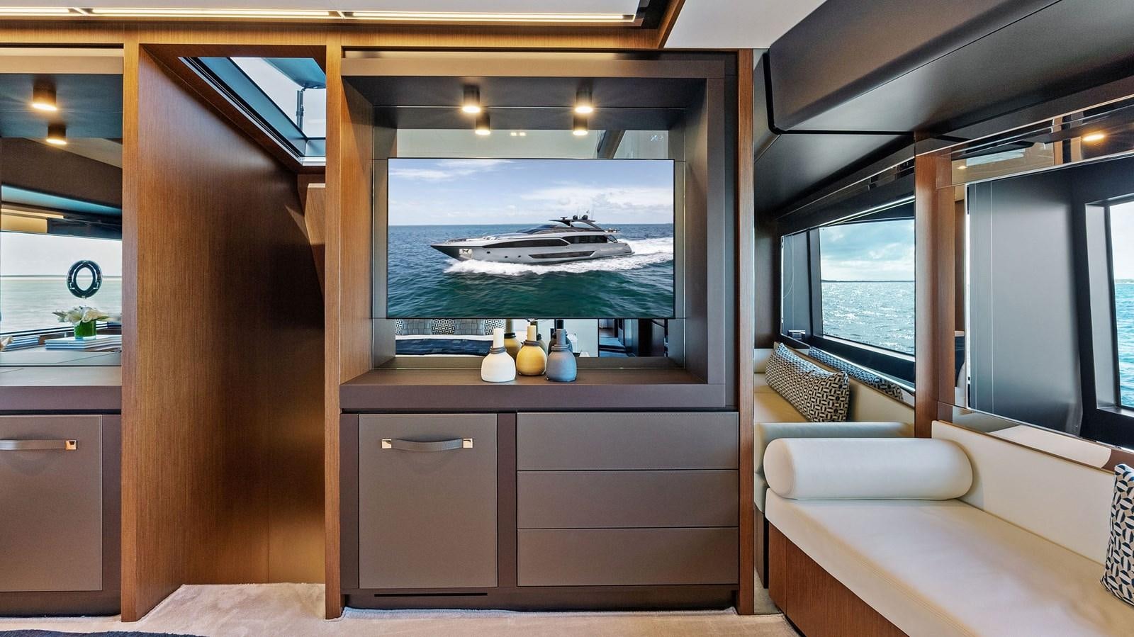 a room with a view of the ocean and a bed aboard HEAVEN Yacht for Sale