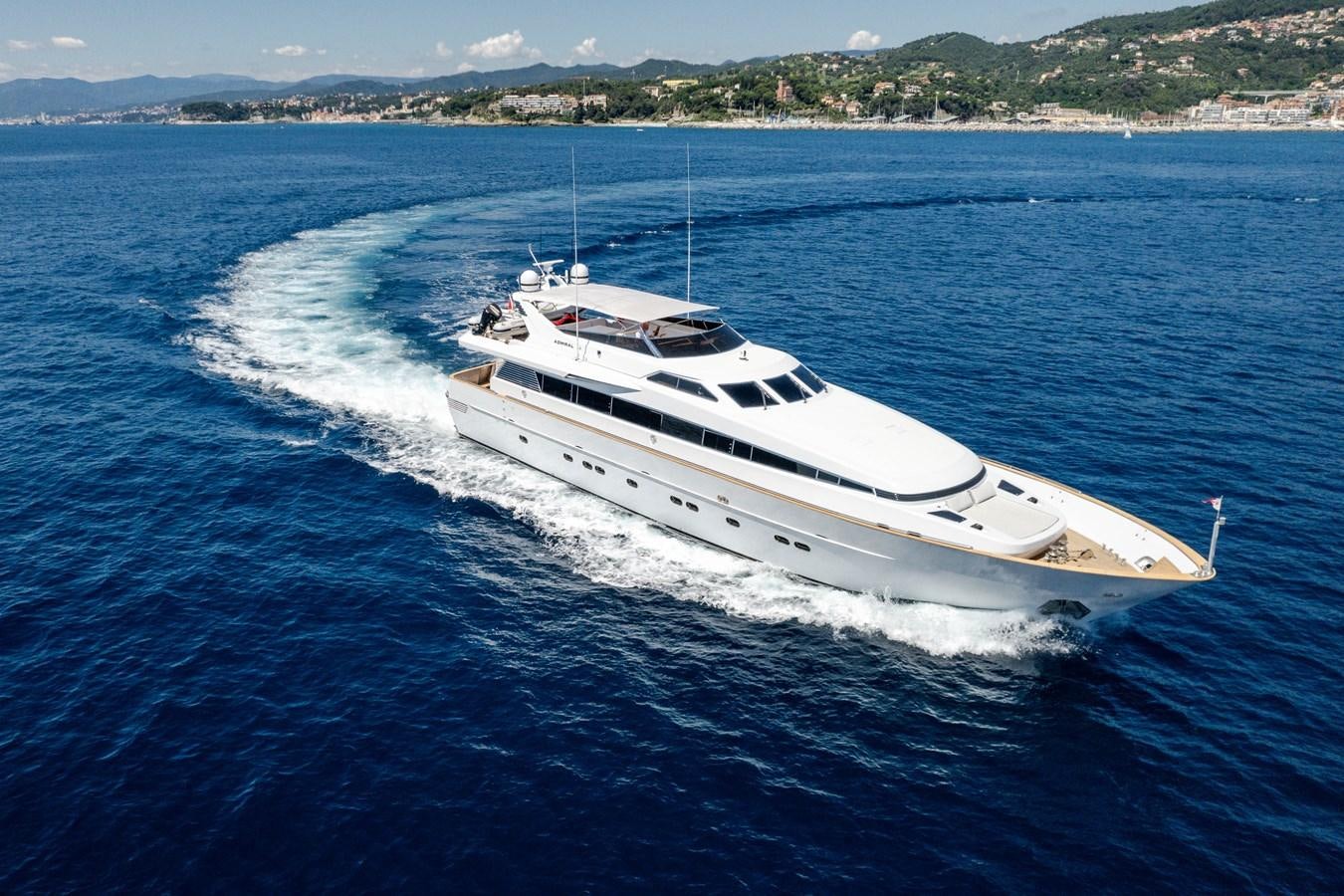 a white yacht on the water aboard VIS Yacht for Sale