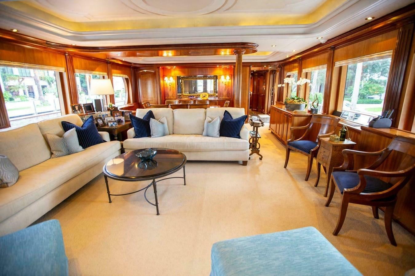 a living room with a couch and a coffee table aboard WATERFORD Yacht for Sale