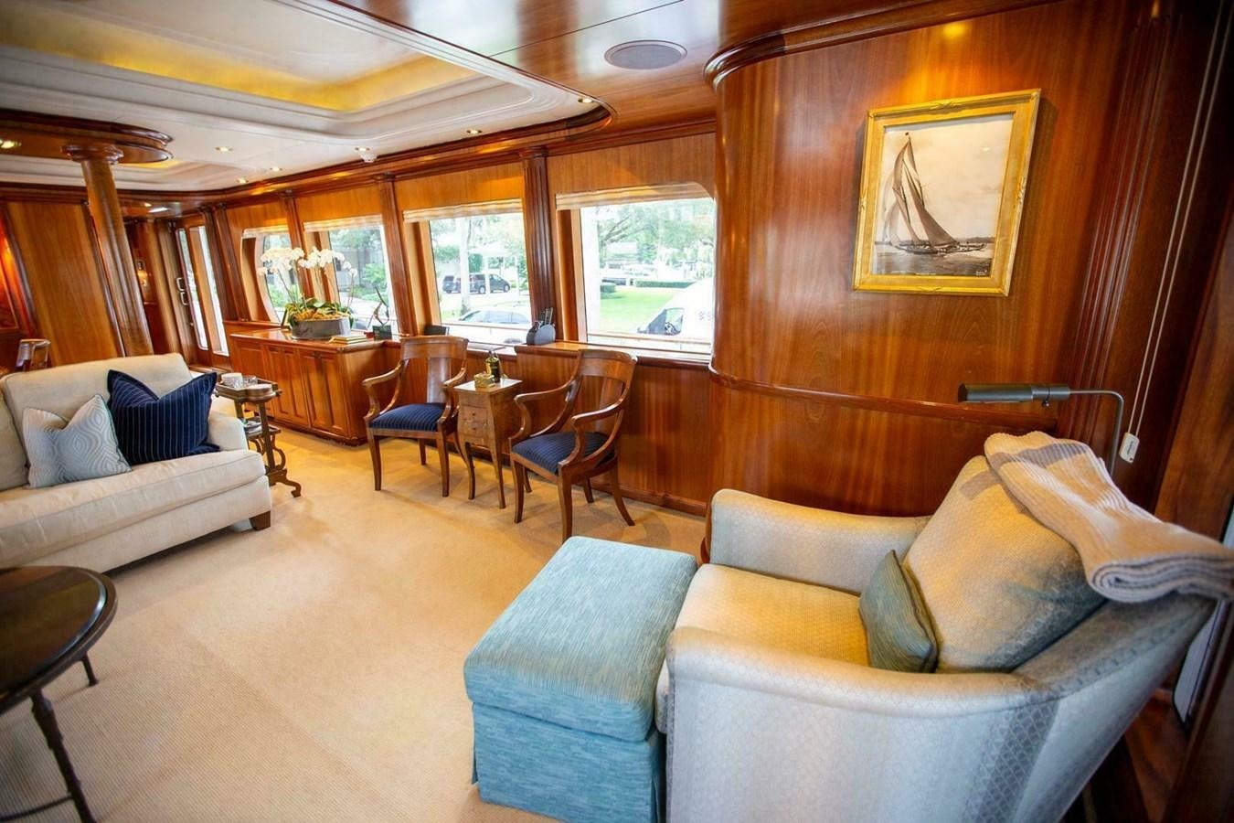 a living room with a couch and chairs aboard WATERFORD Yacht for Sale
