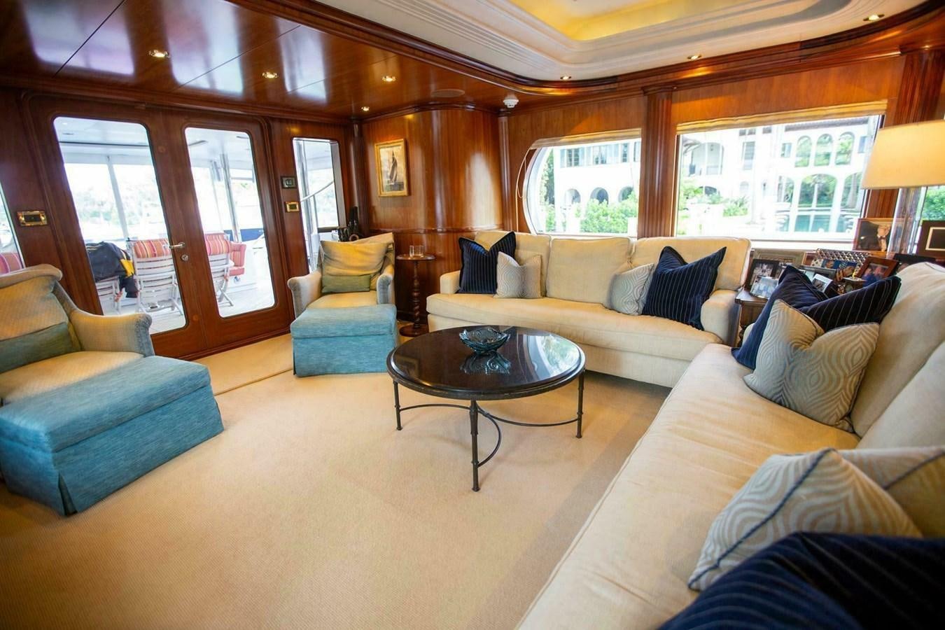 a living room with a couch and a coffee table aboard WATERFORD Yacht for Sale