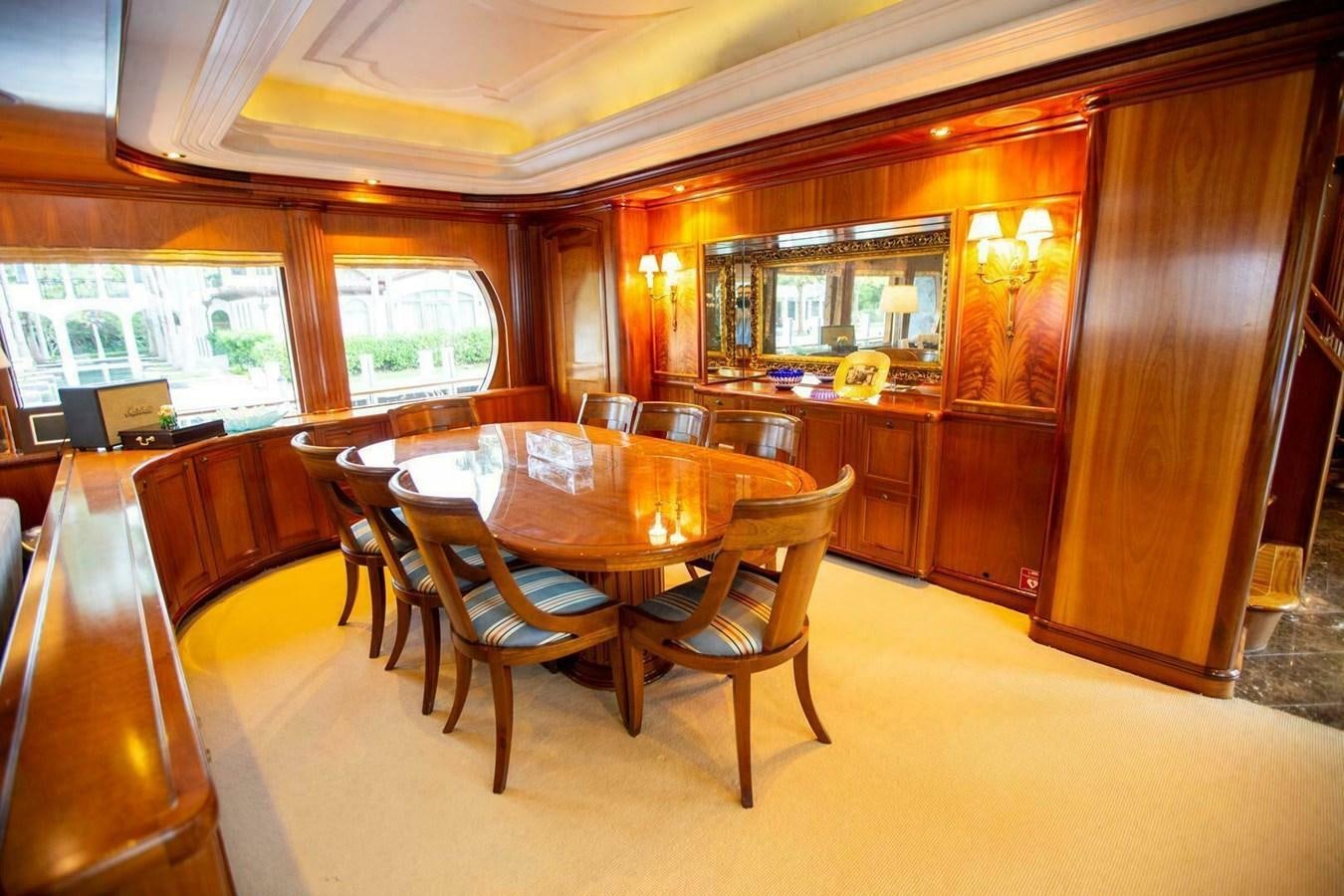 a dining room with a table aboard WATERFORD Yacht for Sale