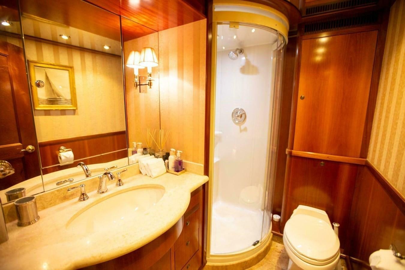 a bathroom with a toilet and sink aboard WATERFORD Yacht for Sale