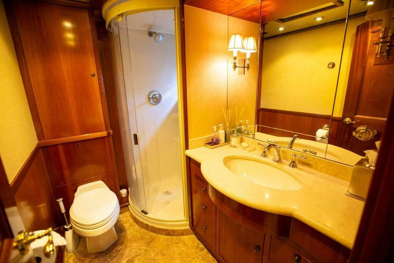 a bathroom with a shower and sink aboard WATERFORD Yacht for Sale