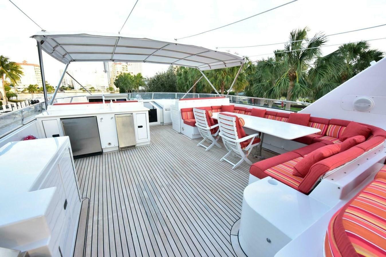 a deck with a covered patio aboard WATERFORD Yacht for Sale