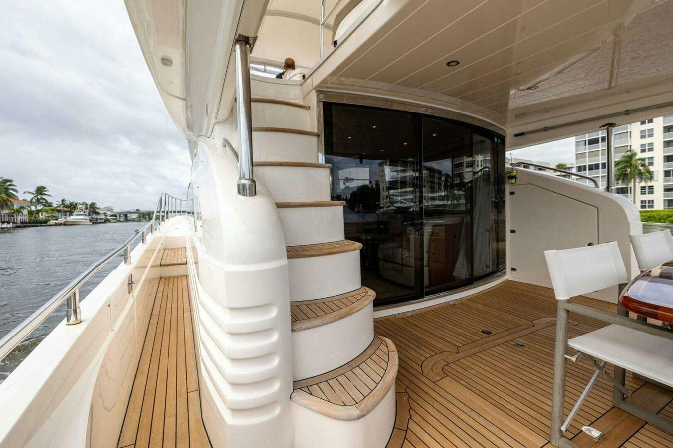a boat on a deck aboard TRINITY Yacht for Sale