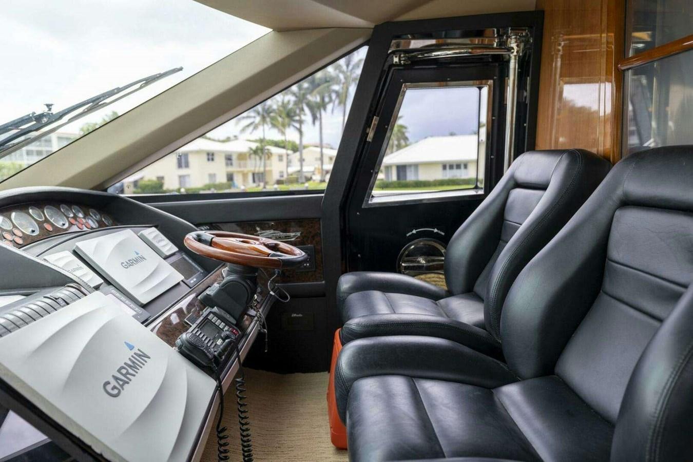 inside of a car aboard TRINITY Yacht for Sale