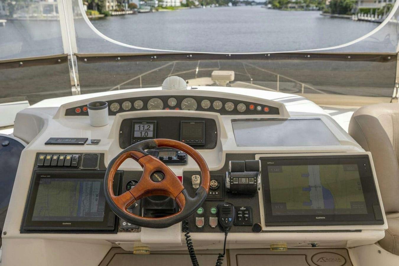the inside of a cockpit aboard TRINITY Yacht for Sale