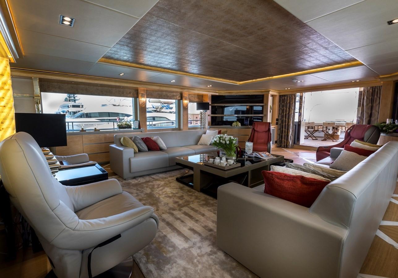 a living room with a large window aboard SEHAMIA Yacht for Sale