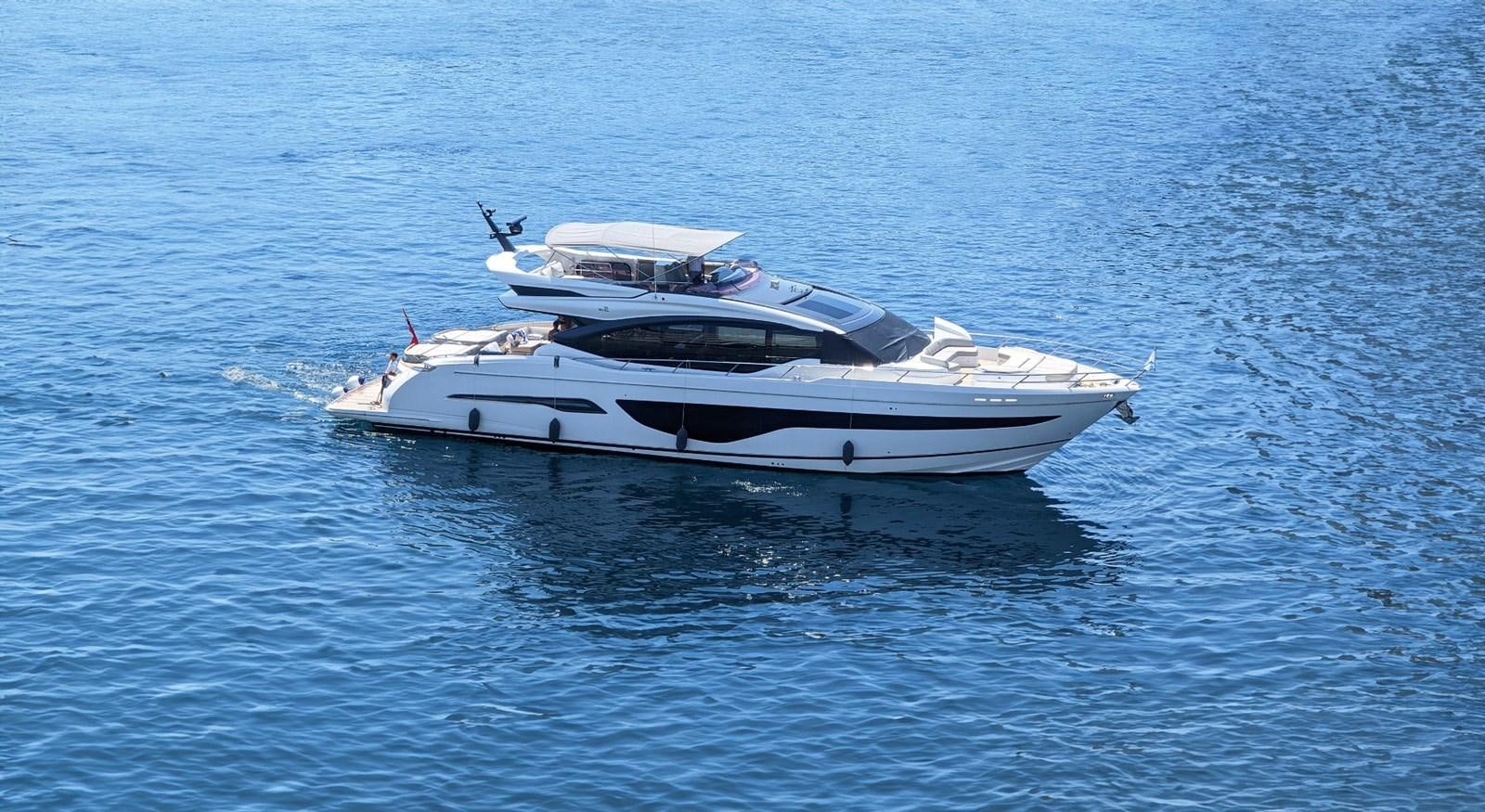 a white yacht in the water aboard ALEXANDRA II Yacht for Sale