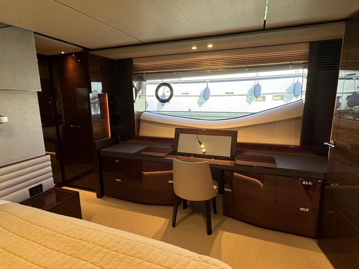 a room with a desk and chairs aboard ALEXANDRA II Yacht for Sale