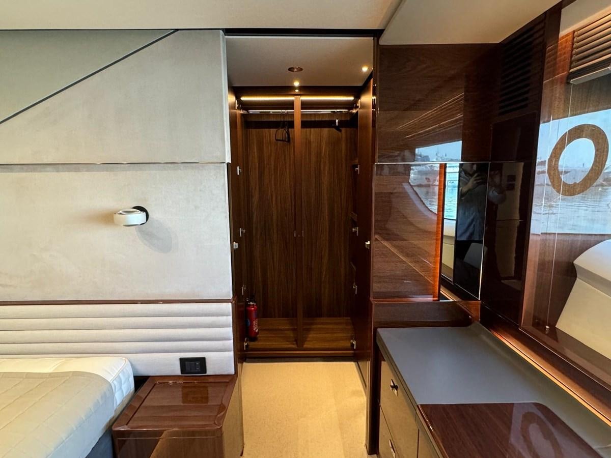 a room with a bed and a door aboard ALEXANDRA II Yacht for Sale