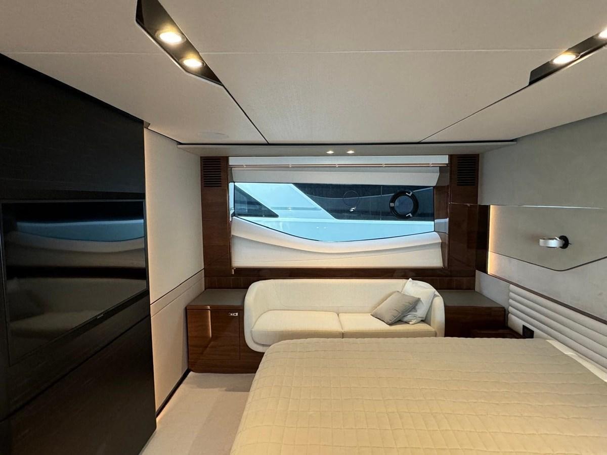a room with a couch and a tv aboard ALEXANDRA II Yacht for Sale