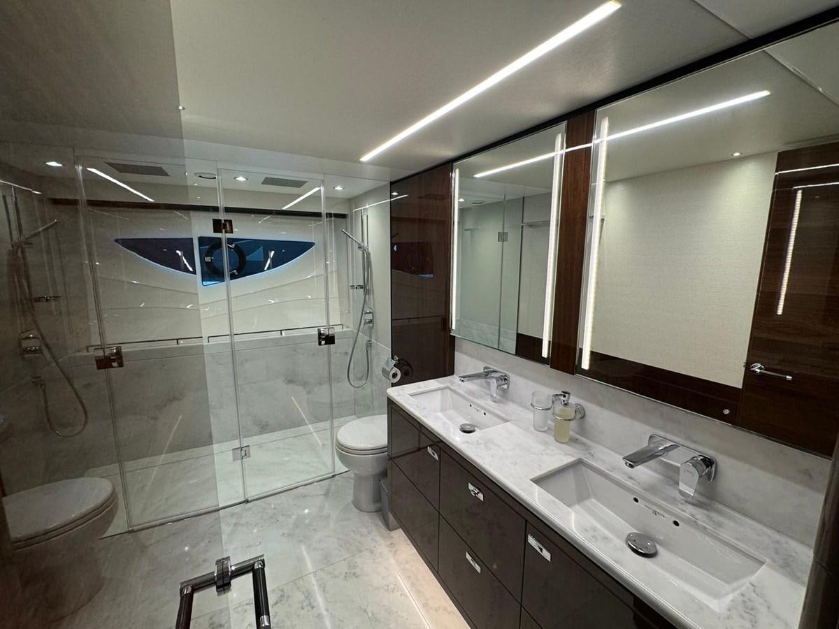 a bathroom with a glass shower aboard ALEXANDRA II Yacht for Sale