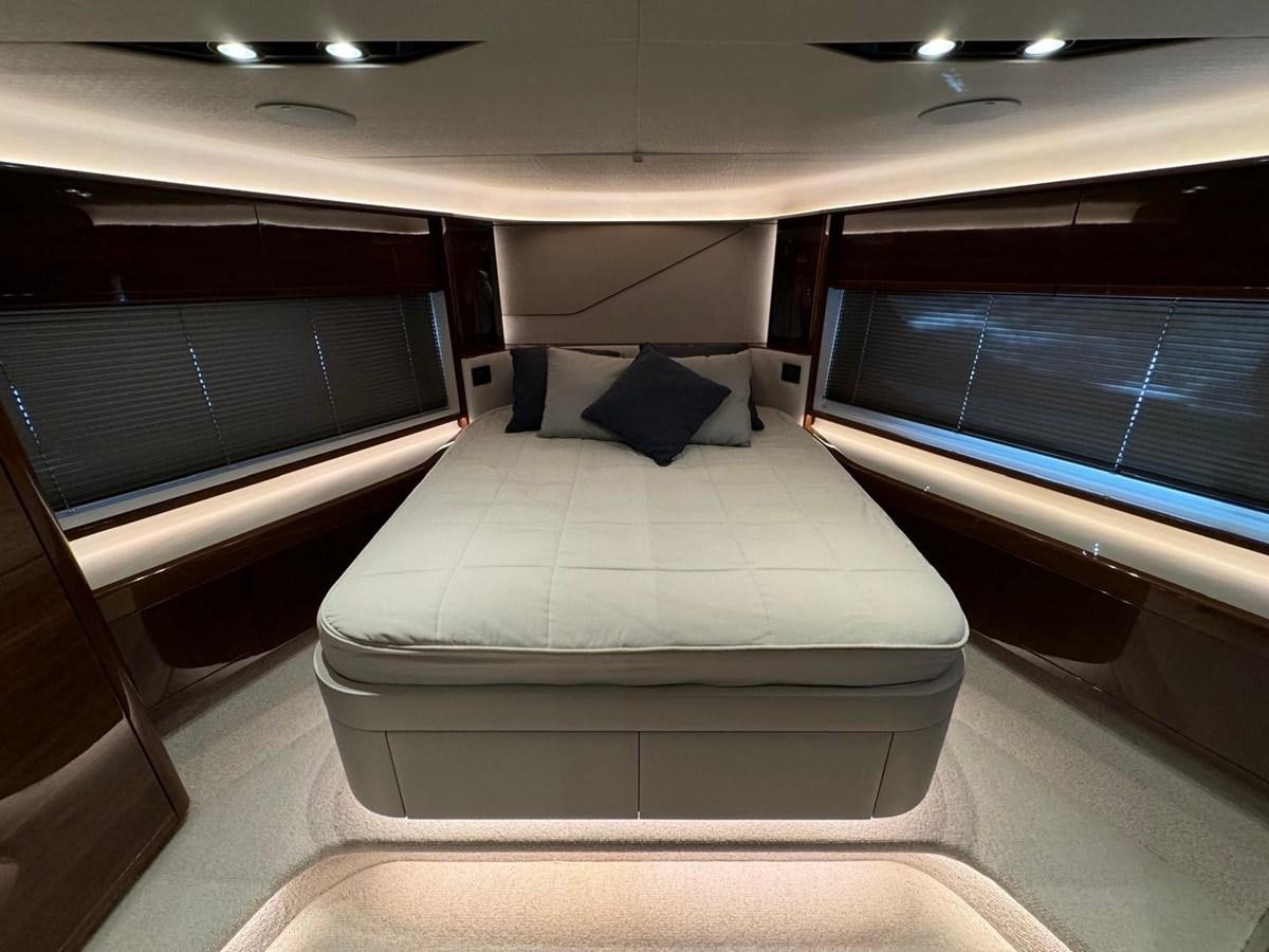 a room with a couch and a tv aboard ALEXANDRA II Yacht for Sale
