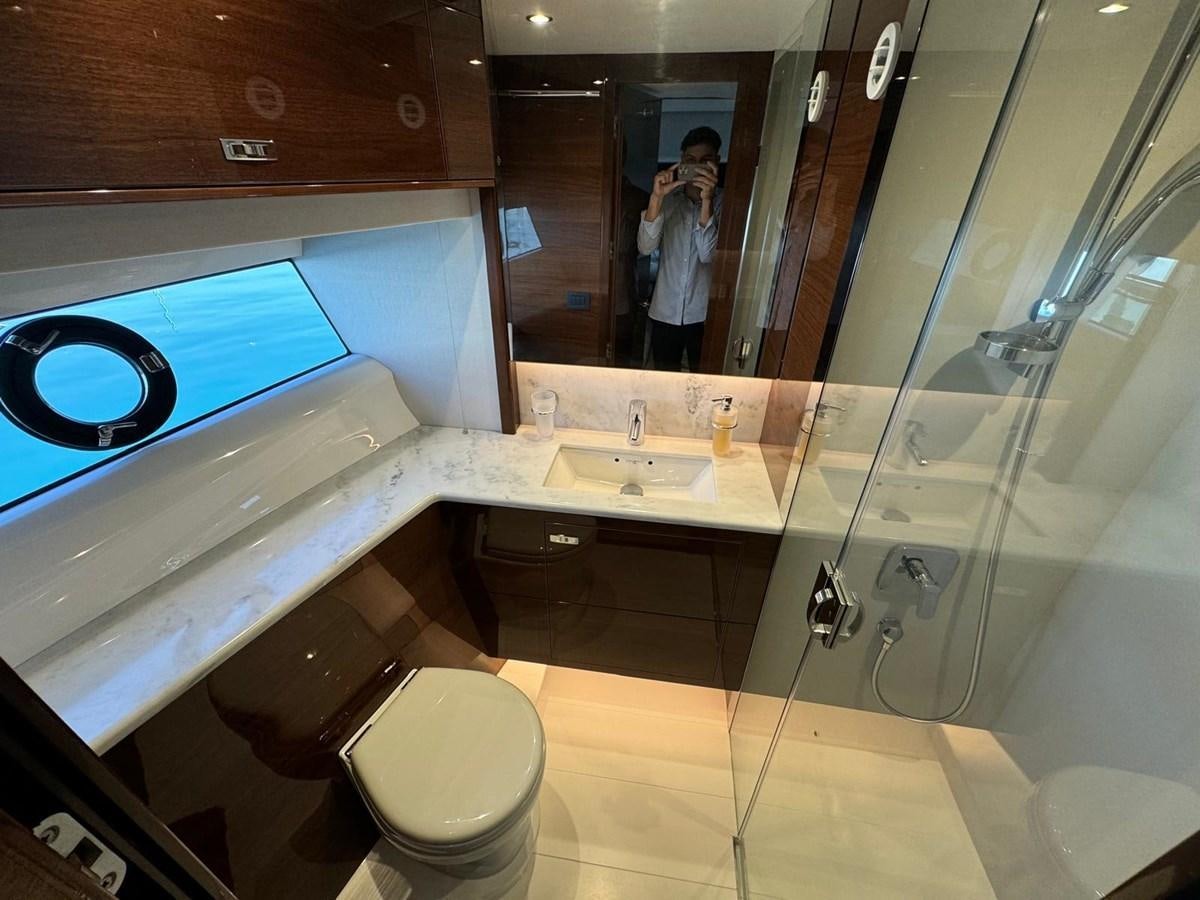 a bathroom with a glass shower aboard ALEXANDRA II Yacht for Sale