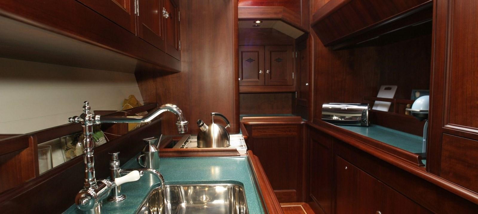 a kitchen with a sink and a counter aboard ALDEBARAN Yacht for Sale