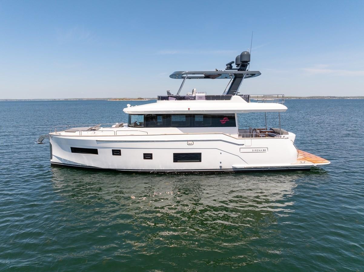 a boat in the water aboard NEW 2023 SIRENA 68 Yacht for Sale
