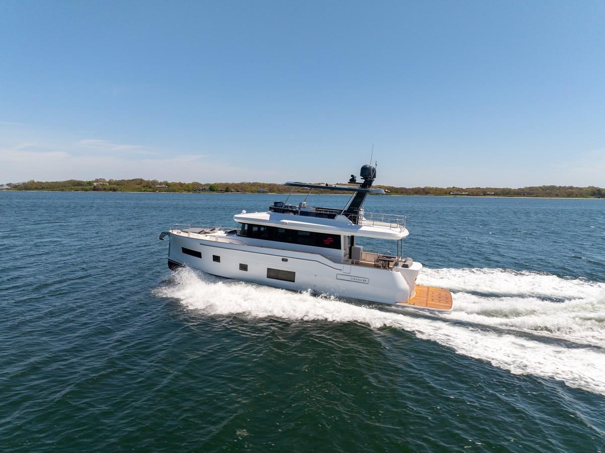 a boat on the water aboard NEW 2023 SIRENA 68 Yacht for Sale