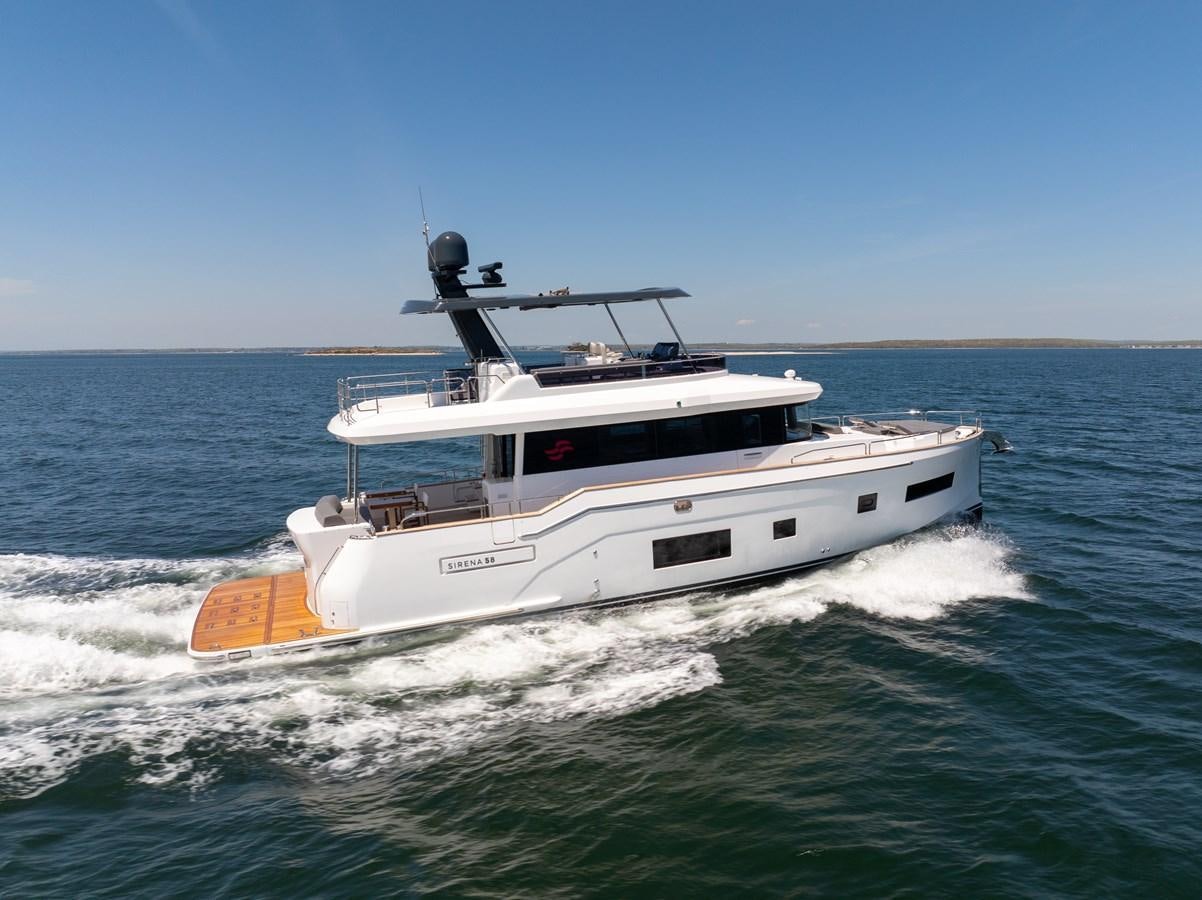 a boat on the water aboard NEW 2023 SIRENA 68 Yacht for Sale