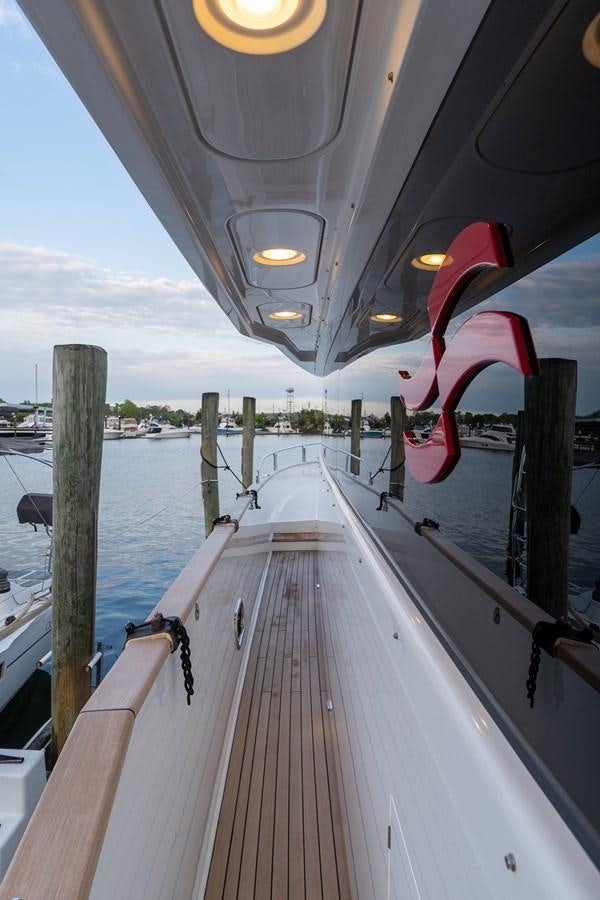 a boat on the water aboard NEW 2023 SIRENA 68 Yacht for Sale