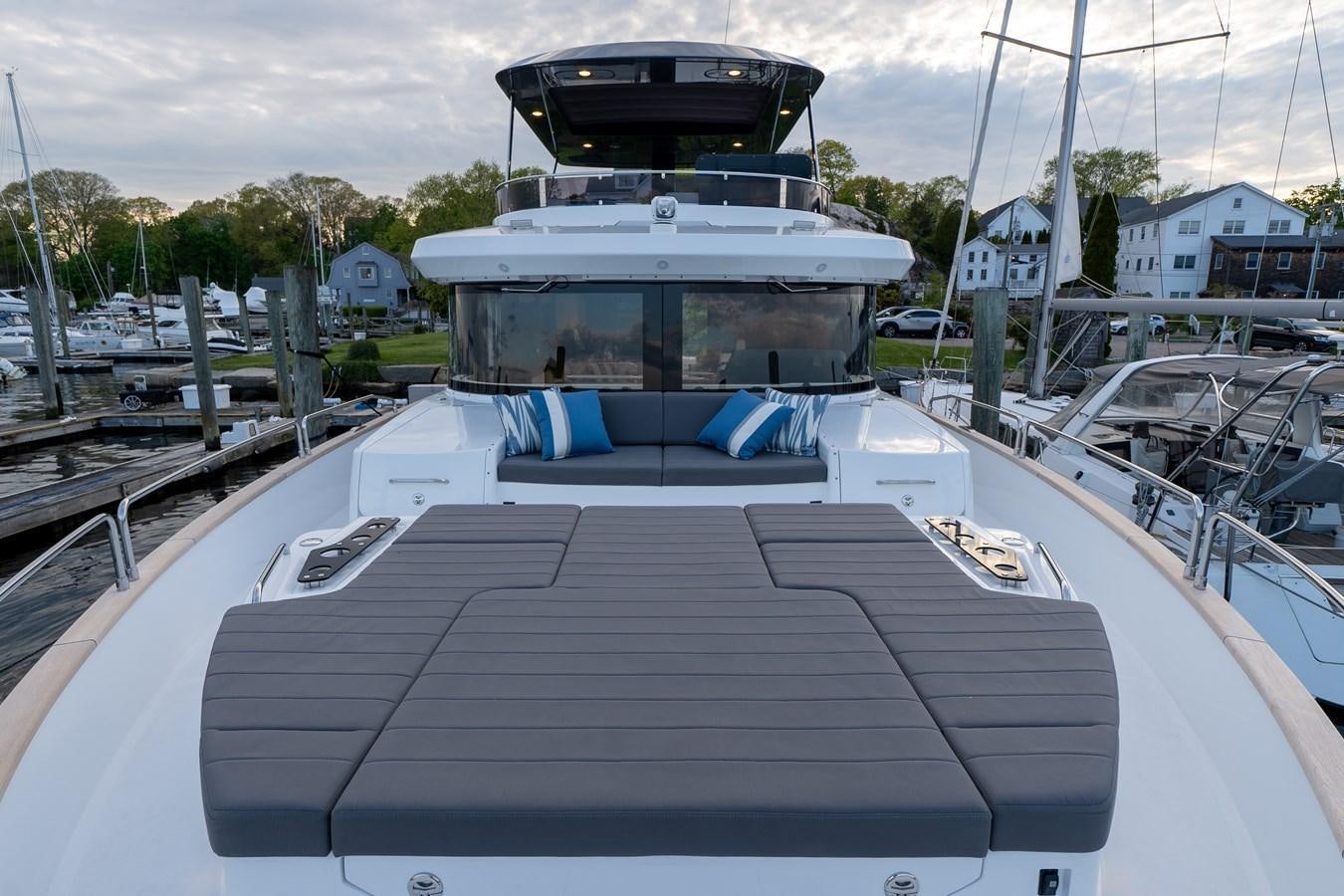 a boat on a dock aboard NEW 2023 SIRENA 68 Yacht for Sale