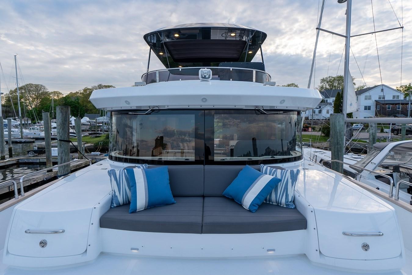 a boat on the water aboard NEW 2023 SIRENA 68 Yacht for Sale