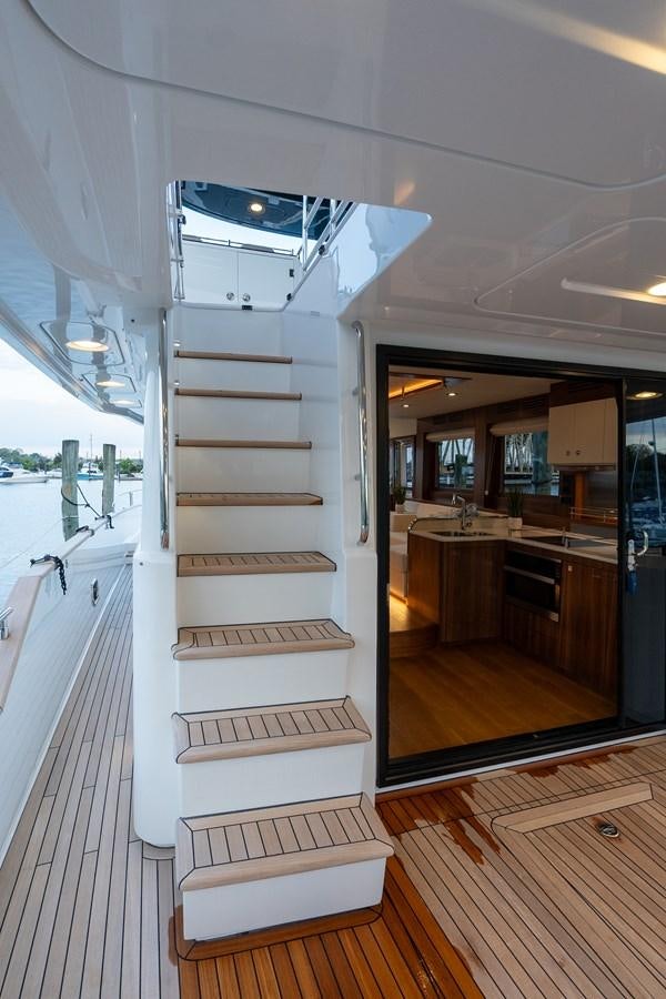 a white ladder in a room aboard NEW 2023 SIRENA 68 Yacht for Sale