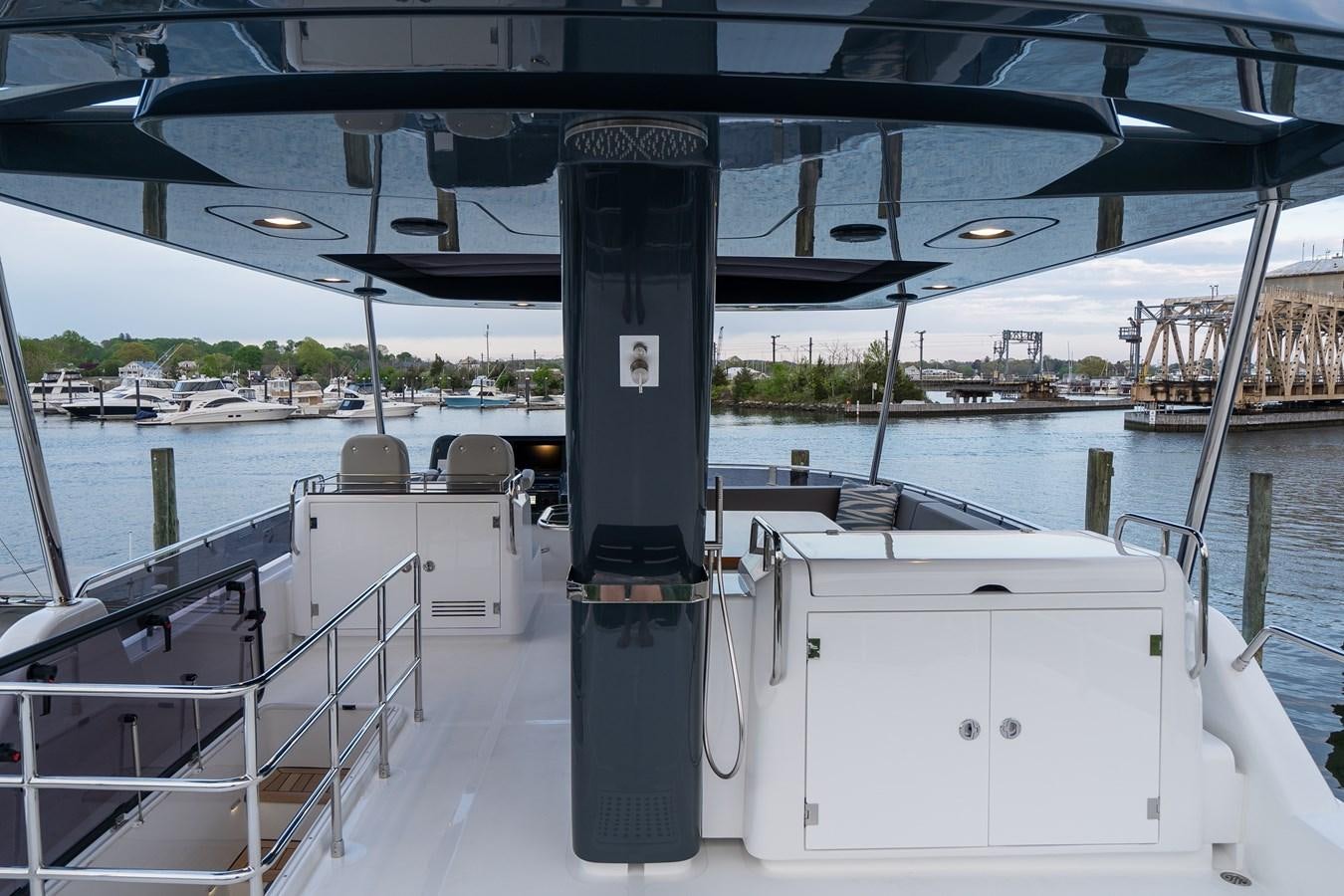 a boat dock with boats aboard NEW 2023 SIRENA 68 Yacht for Sale