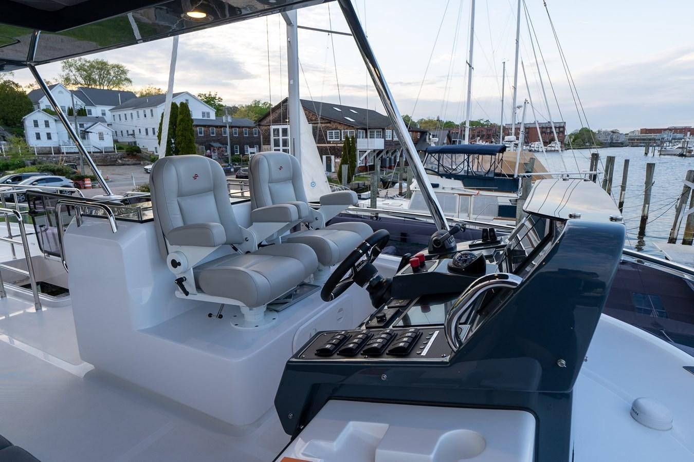 a boat with seats on the deck aboard NEW 2023 SIRENA 68 Yacht for Sale