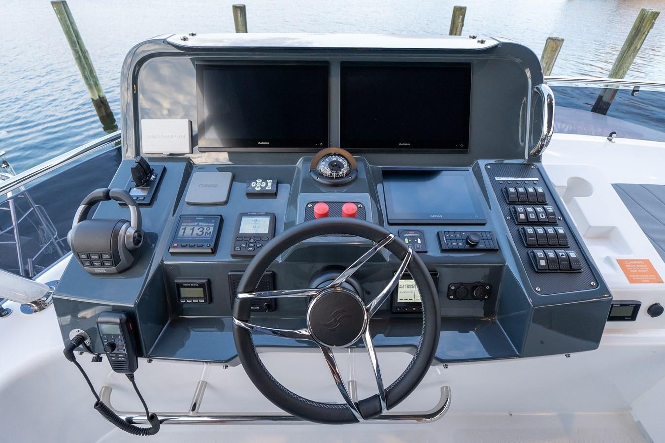 the inside of a car aboard NEW 2023 SIRENA 68 Yacht for Sale