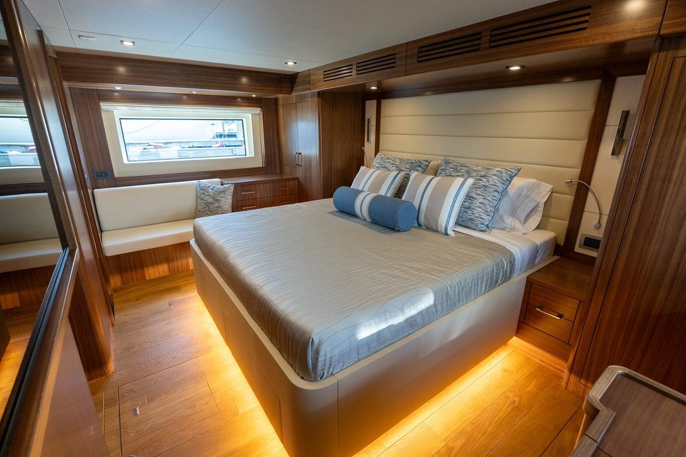 a bed in a room aboard NEW 2023 SIRENA 68 Yacht for Sale