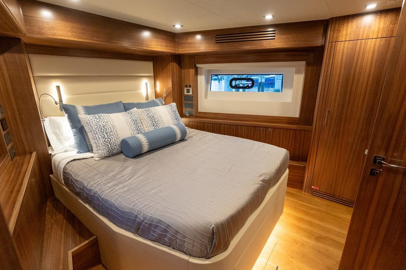 a bed in a room aboard NEW 2023 SIRENA 68 Yacht for Sale