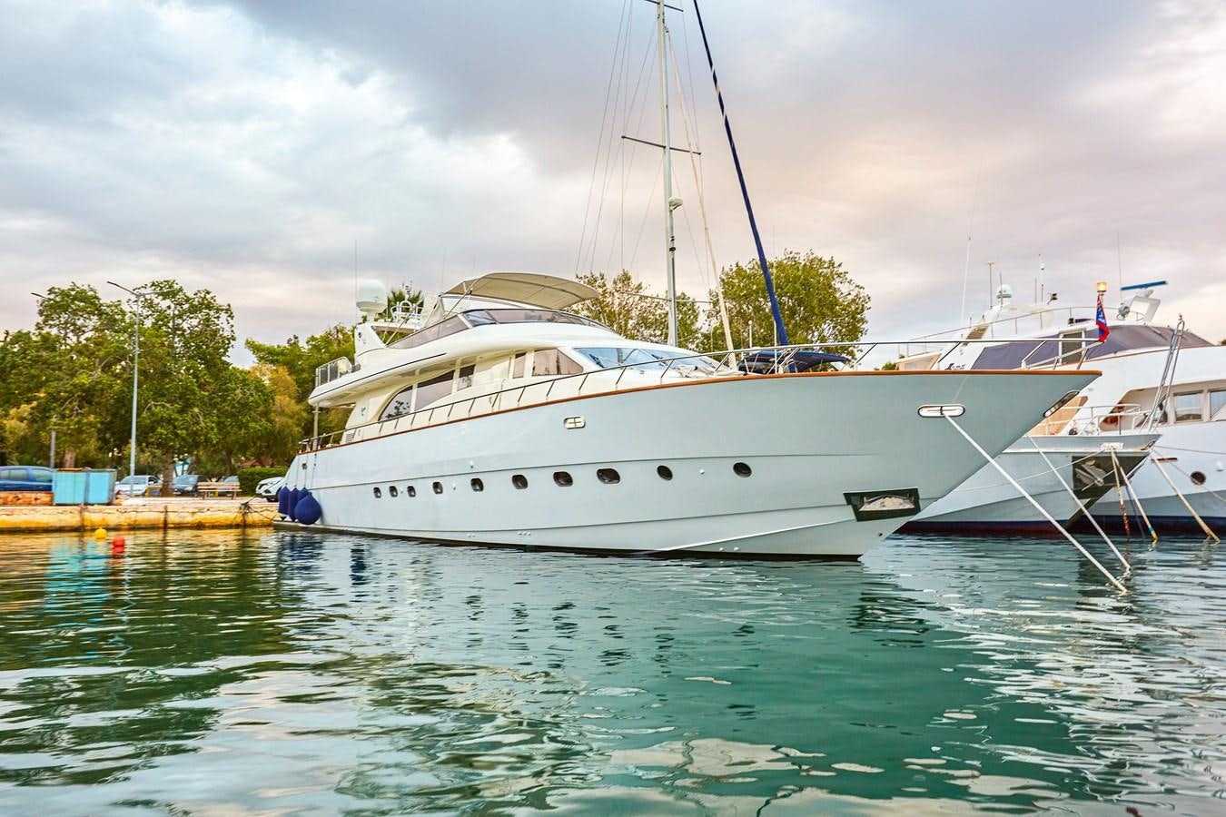 a couple of boats in a harbor aboard LEOPARD 26 FLY Yacht for Sale