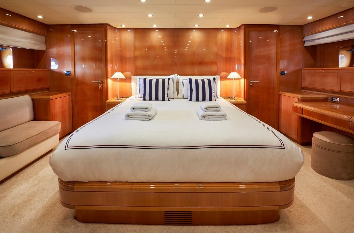 a bed in a room aboard LEOPARD 26 FLY Yacht for Sale