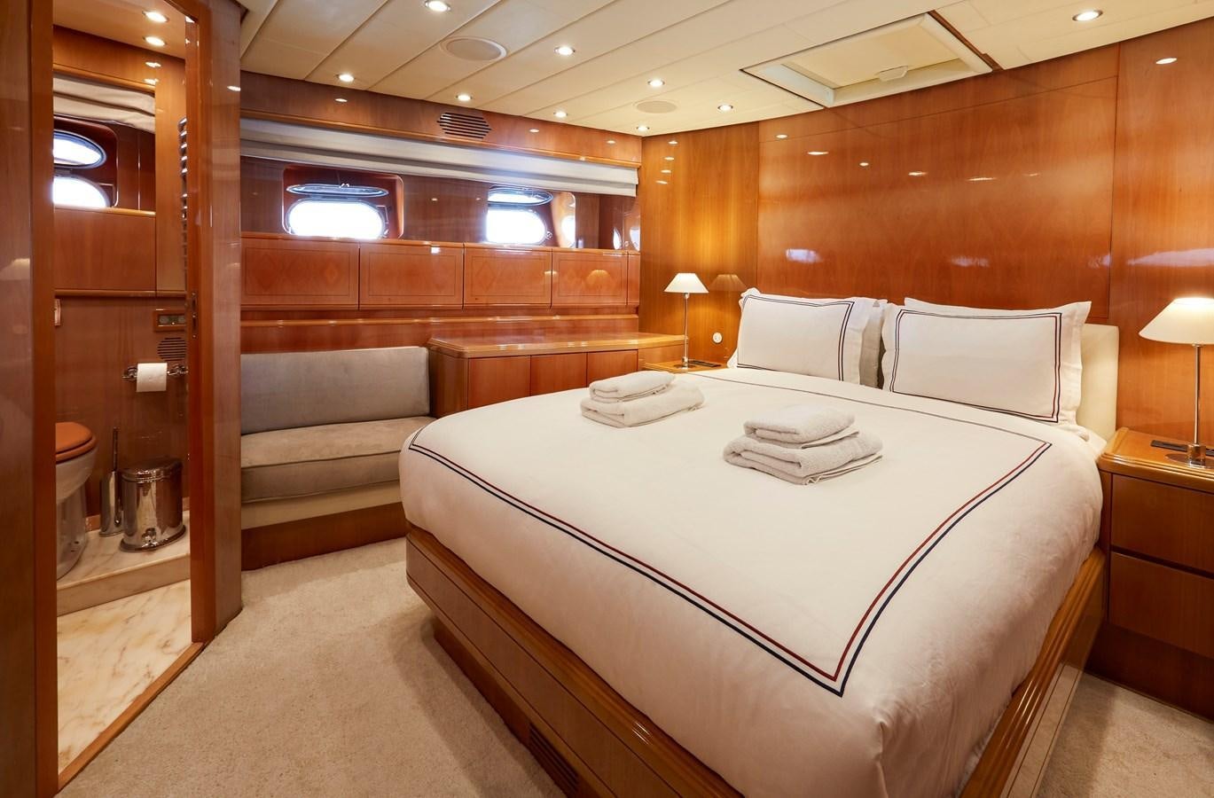 a bed in a room aboard LEOPARD 26 FLY Yacht for Sale