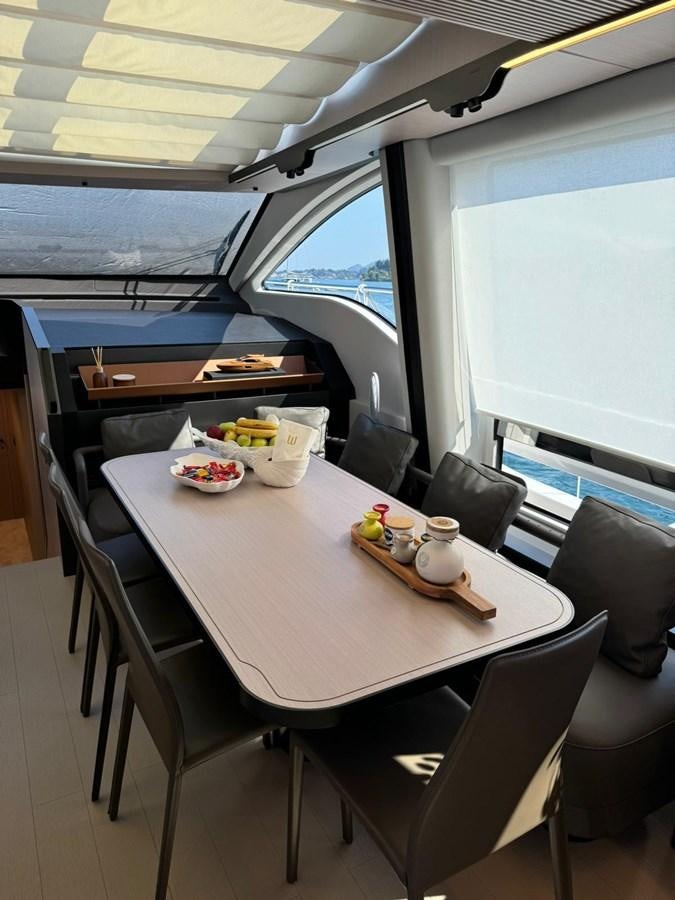 a table with food on it aboard KING LIAM Yacht for Sale