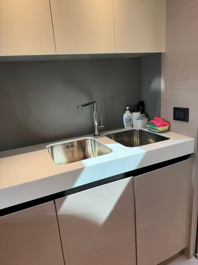 a kitchen with a sink and cabinets aboard KING LIAM Yacht for Sale