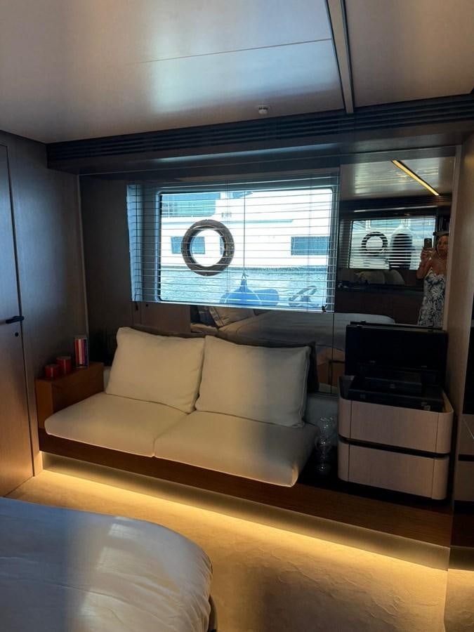 a living room with a large window aboard KING LIAM Yacht for Sale