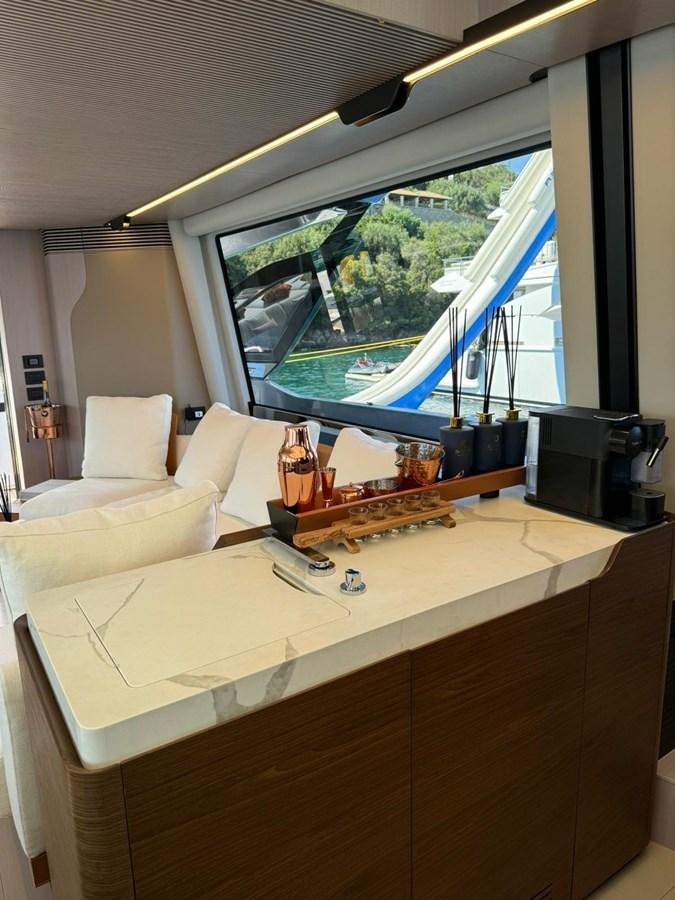 a room with a large window aboard KING LIAM Yacht for Sale