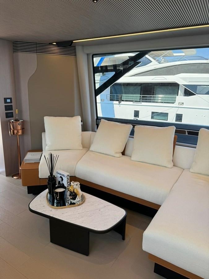 a living room with a large window aboard KING LIAM Yacht for Sale