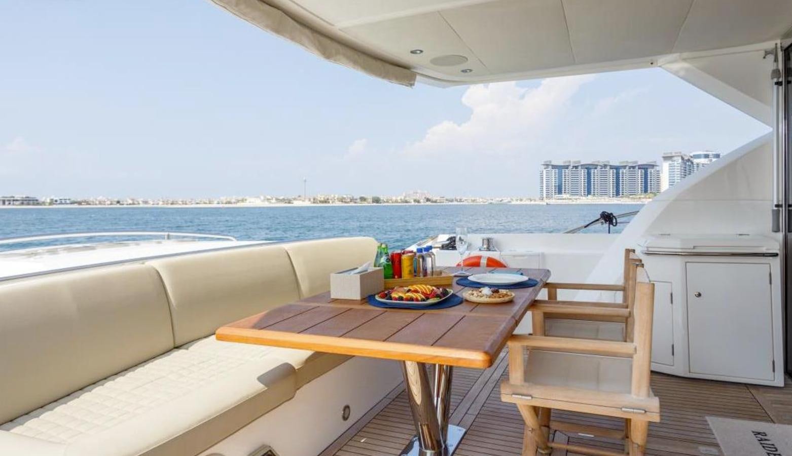 a table with food on it aboard RAIDEX Yacht for Sale