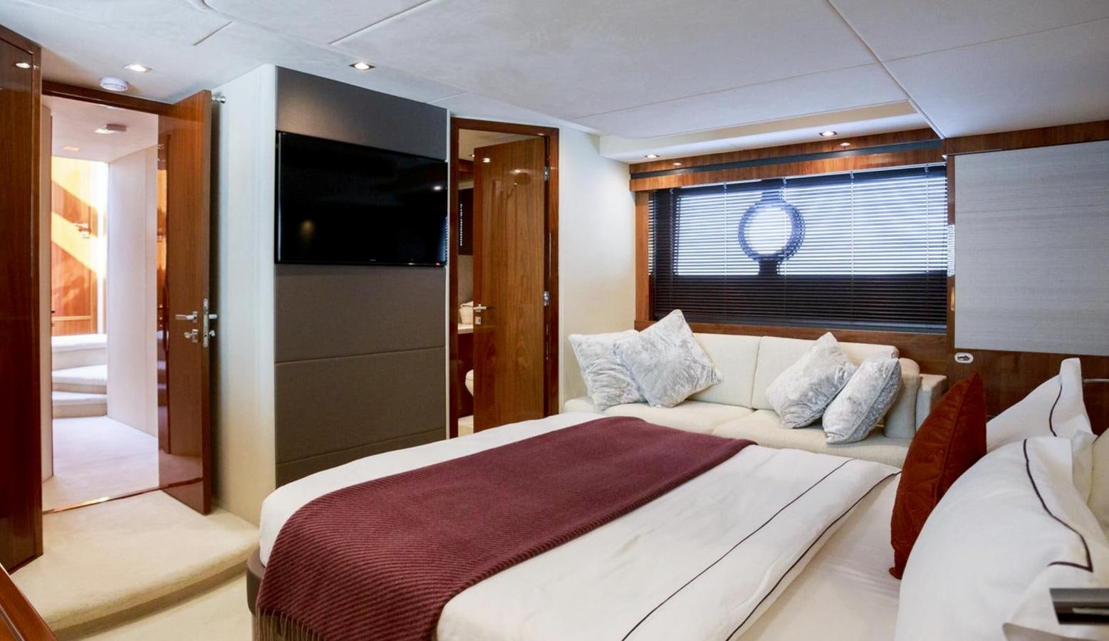 a bed in a room aboard RAIDEX Yacht for Sale