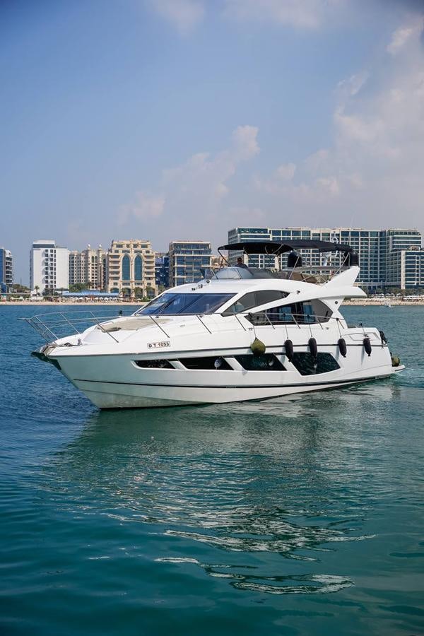 a white yacht in the water aboard RAIDEX Yacht for Sale